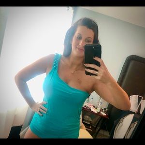 Wet seal, turquoise one shoulder shirt. No beading has fallen off. Perfect!